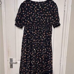 Elegant Black Dress with Floral Design